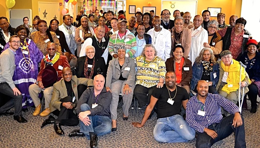 LGBT Elders of Color pose for a large group photo