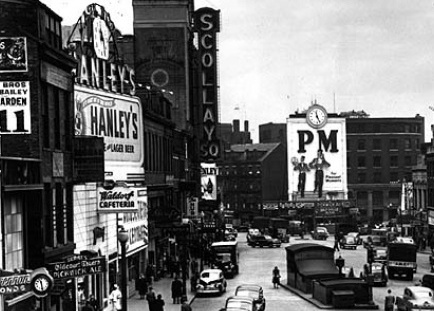 Scollay Square, Boston's entertainment district until the early 1960s, was home to a number of bars frequented by gay men and lesbians. Three of those establishments are visible in this 1940s photo: The Half Dollar (under the "PM" sign); The Lighthouse, to the right of the Half Dollar; and the Crawford House, on the far right.