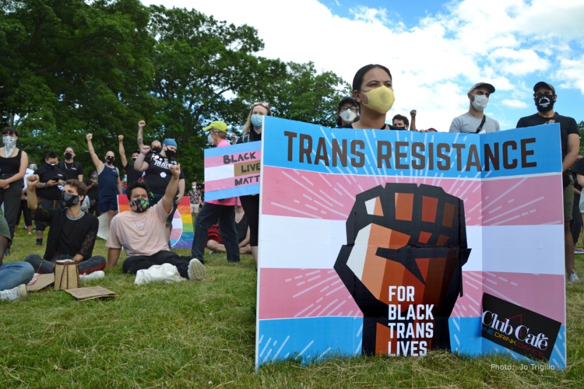 Protestor Holding Trans Resistance for Black Trans Lives Sign, by jo trigilio
