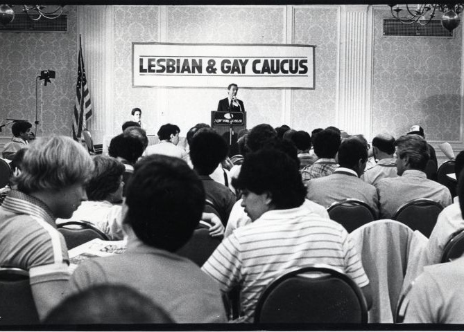 Tom Barstow address the Gay and Lesbian Caucus, 1980, Gay Community News Photograph Collection